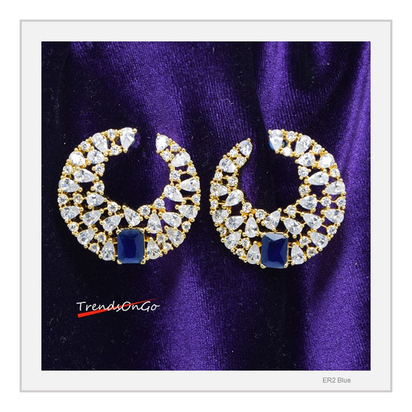 Gold Toned Diamond Earrings - Crescent Shaped Studs has Artificial Diamonds & Blue Gem