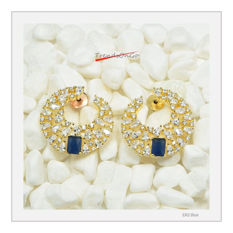 Gold Toned Diamond Earrings - Crescent Shaped Studs has Artificial Diamonds & Blue Gem