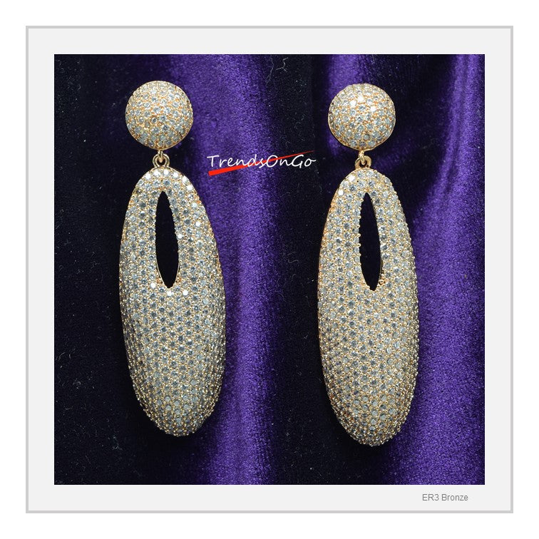 Gold Toned Oval shape Drop Earrings, Rhodium-Plated has white Artificial Diamonds