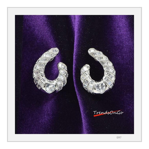 Silver Toned Diamond Studs - Rhodium Plated Teardrop Shaped Earrings has Artificial Diamonds