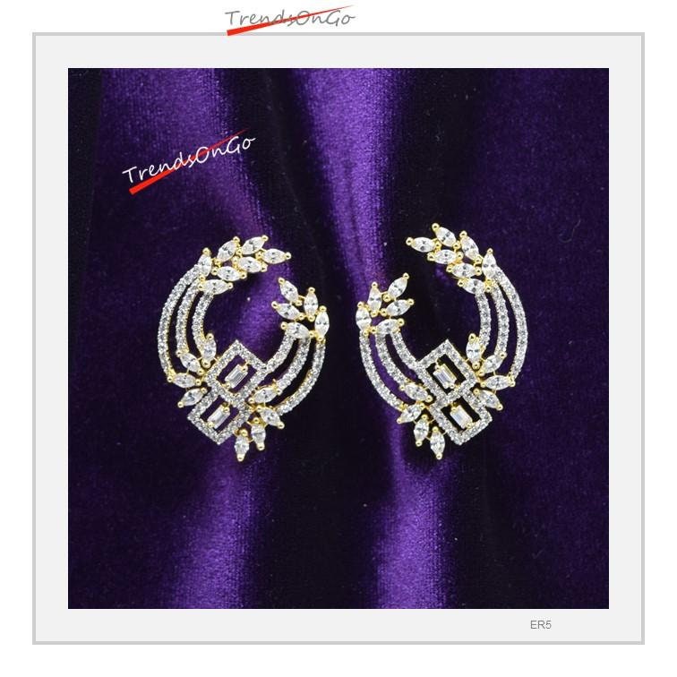 Gold Toned Diamond Earrings - Contemporary Studs has White Simulated Diamonds