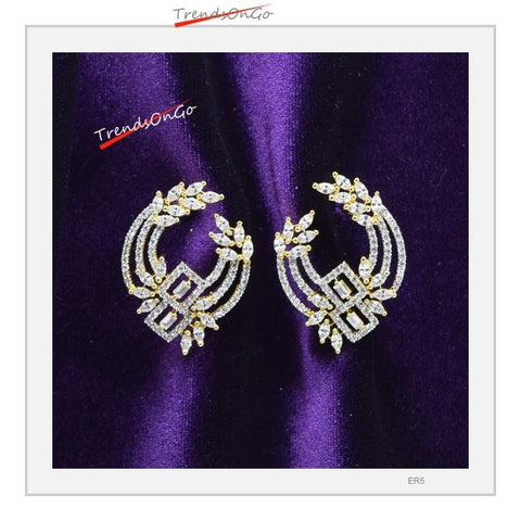 Gold Toned Diamond Earrings - Contemporary Studs has White Simulated Diamonds